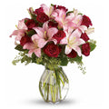 Bouquet of Pink Lilies, Red Roses and Waxflower with greenery;