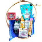 Gin and Tonic Basket gift featuring gin, chocolates, gourmet snacks and nuts